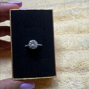 925 Sterling silver band with 1ct sky blue moissanite diamond surrounded by CZ 6